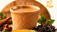 Edible cup of hot tea with cinnamon and tea leaves